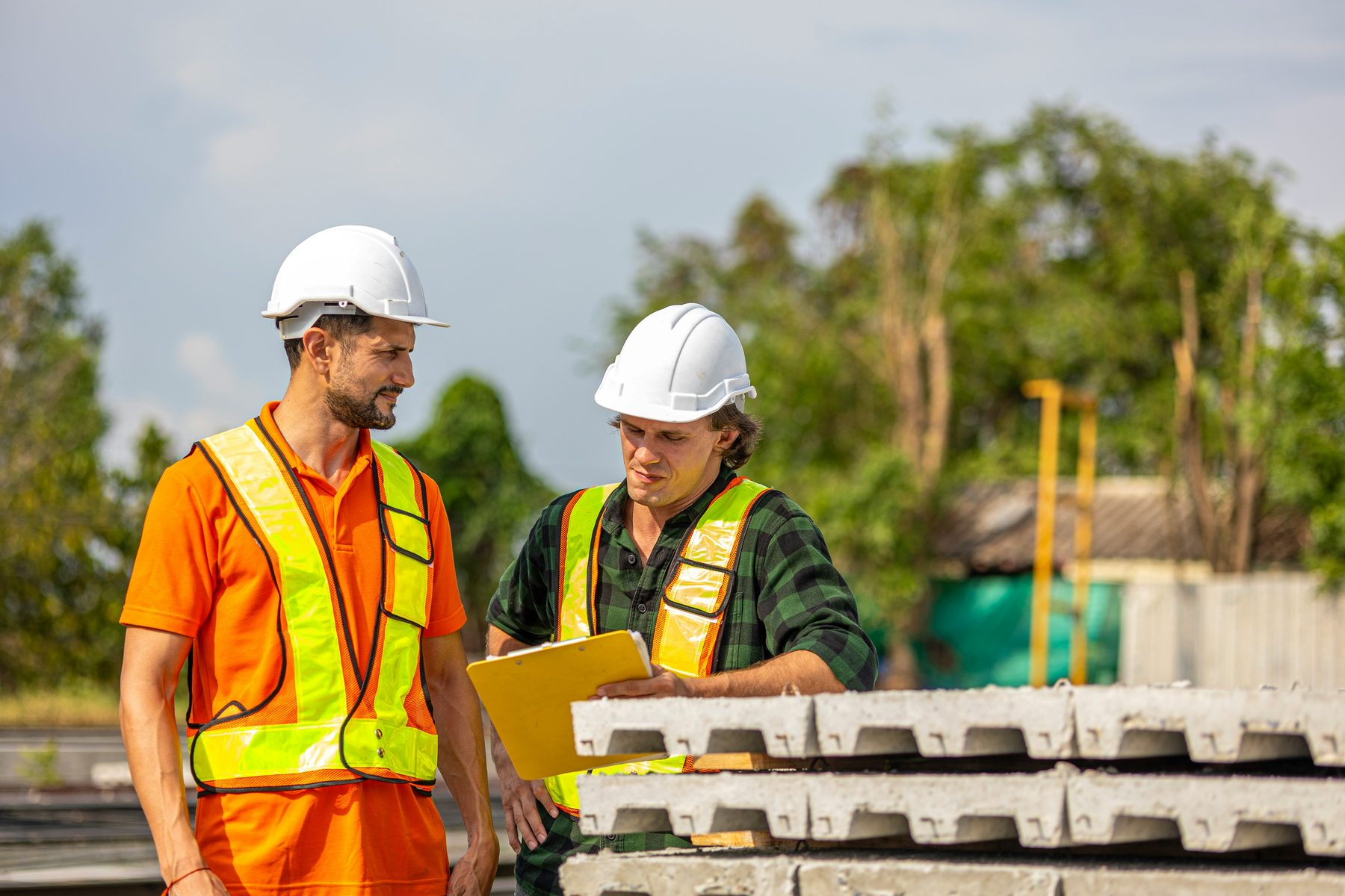 Contractor holding a tablet (documentation)